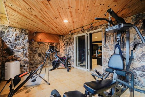 Fitness Equipment, Interior, Recessed Lighting, Stone Walls, Wooden Ceilings