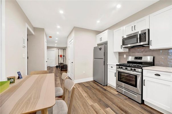 Interior, Kitchen, Recessed Lighting, Stainless Steel Appliances, Wood Texture Flooring