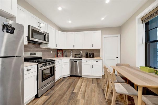 Interior, Kitchen, Recessed Lighting, Stainless Steel Appliances, Wood Texture Flooring