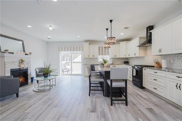 Fireplace, Interior, Kitchen, Pendant Lights, Recessed Lighting, Stainless Steel Appliances, Wood Texture Flooring