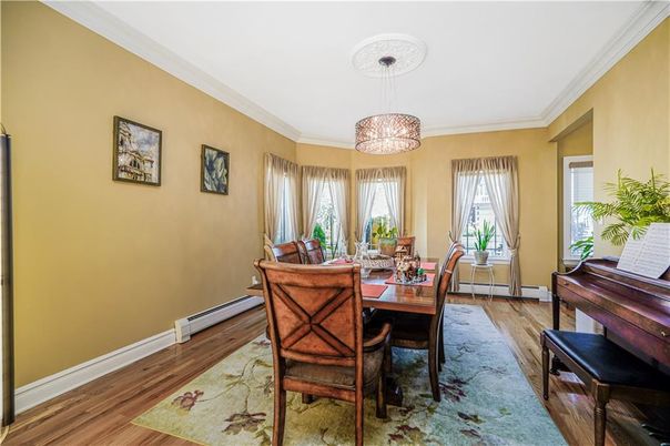 Chandelier, Dining room, Interior, Piano, Wood Texture Flooring