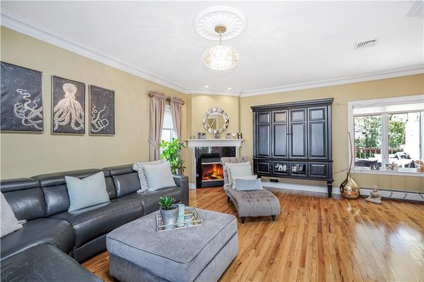 Chandelier, Fireplace, Interior, Living room, Recessed Lighting, Wood Texture Flooring