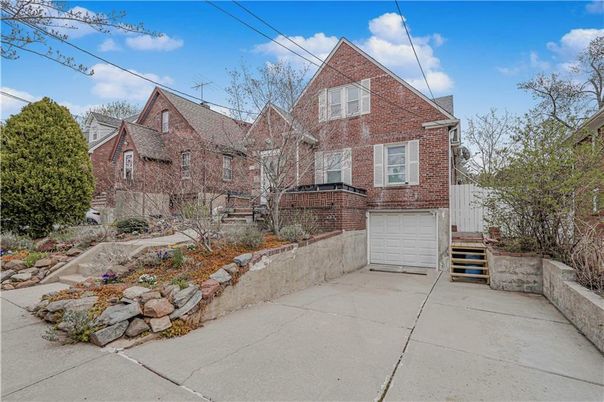 Attached, Exterior, Facade, Brick Facade, Tudor Revival