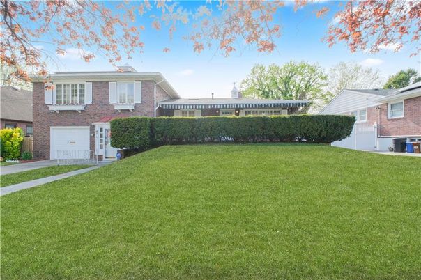 Attached, Backyard, Exterior, Facade, Brick Facade, Split Level