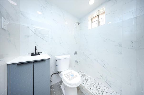 Bathroom, Interior, Marble Walls, Recessed Lighting, Wood Texture Flooring
