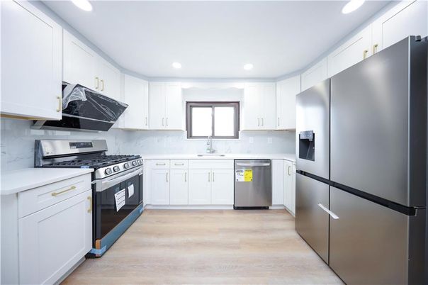 Interior, Kitchen, Recessed Lighting, Stainless Steel Appliances, Wood Texture Flooring