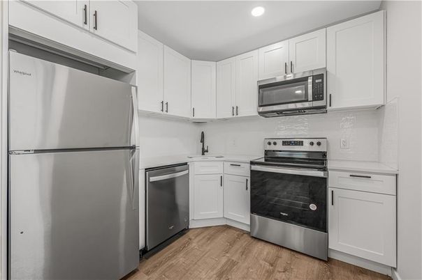 Interior, Kitchen, Recessed Lighting, Stainless Steel Appliances, Wood Texture Flooring