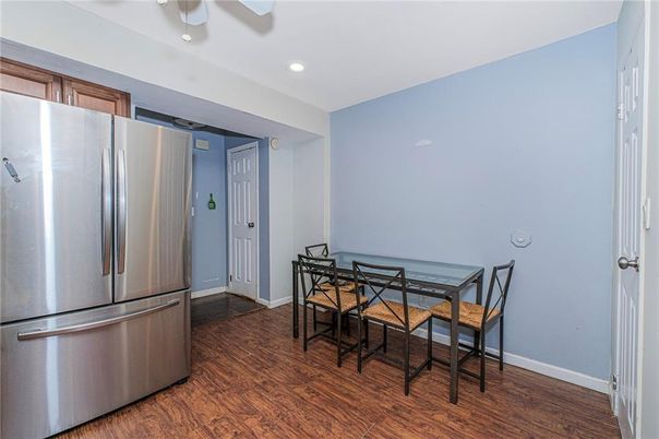 Dining room, Interior, Kitchen, Recessed Lighting, Stainless Steel Appliances, Wood Texture Flooring