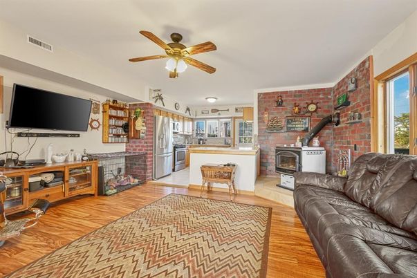 Fireplace, Interior, Kitchen, Living room, Stainless Steel Appliances, Stone Walls, Wood Texture Flooring