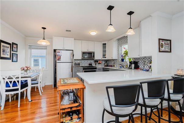 Dining room, Interior, Kitchen, Pendant Lights, Stainless Steel Appliances, Wood Texture Flooring