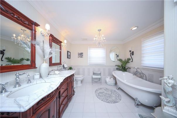 Bathroom, Chandelier, Dual Sink Vanities, Free Standing Baths, Interior, Recessed Lighting