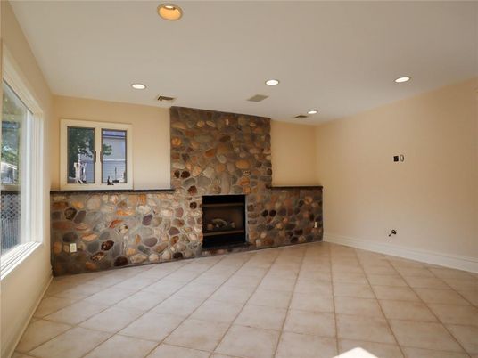 Empty room, Fireplace, Interior, Recessed Lighting, Stone Walls
