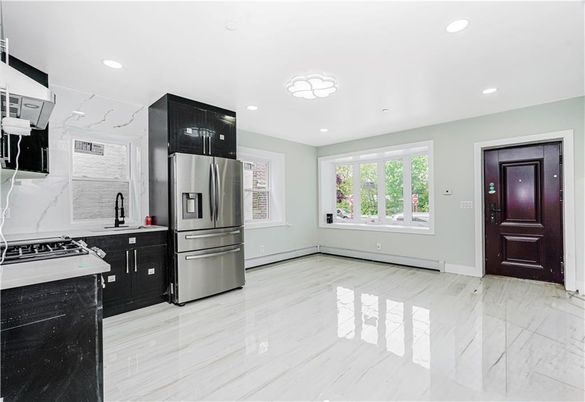 Interior, Kitchen, Marble, Marble Walls, Recessed Lighting, Stainless Steel Appliances