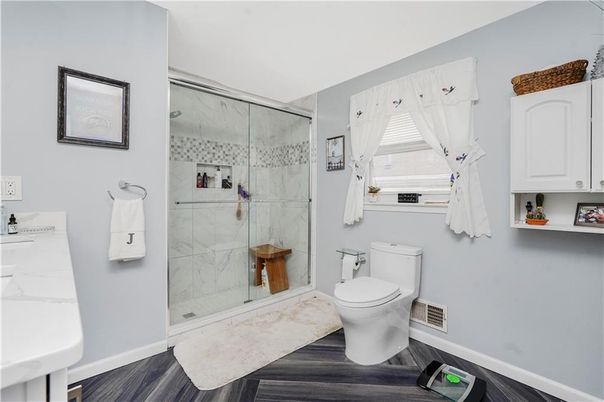 Bathroom, Glass Shower, Interior, Marble Walls, Wood Texture Flooring