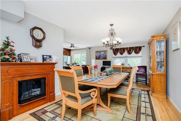 Chandelier, Dining room, Fireplace, Interior, Wood Texture Flooring