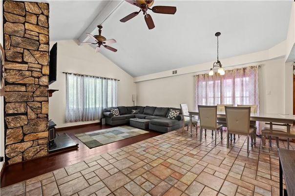 Dining room, Fireplace, Interior, Living room, Pendant Lights, Stone Walls
