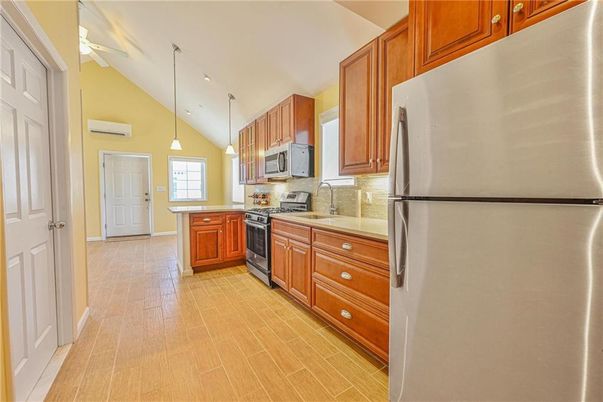 Interior, Kitchen, Pendant Lights, Stainless Steel Appliances, Wood Texture Flooring