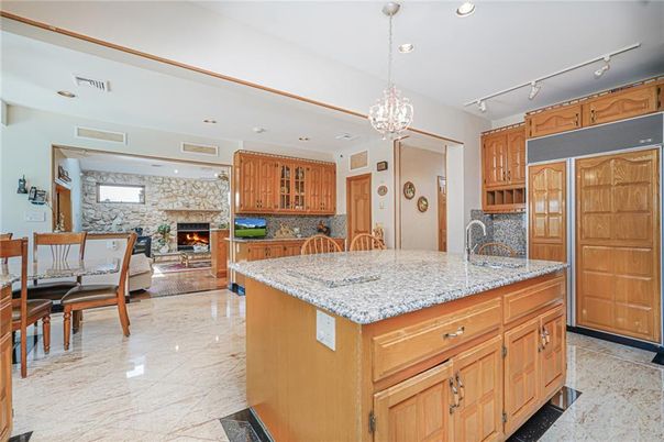 Chandelier, Dining room, Fireplace, Interior, Kitchen, Pendant Lights, Recessed Lighting, Stone Walls
