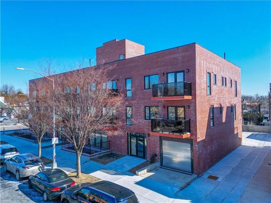 Exterior, Facade, Brick Facade, Condo Building