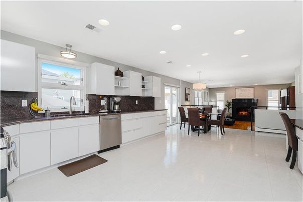 Dining room, Fireplace, Interior, Kitchen, Pendant Lights, Recessed Lighting, Stainless Steel Appliances