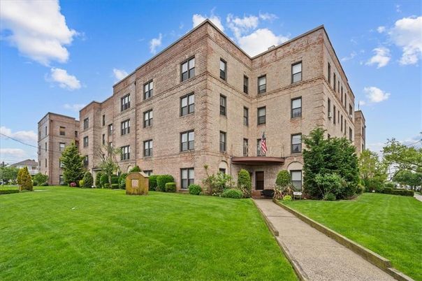 Backyard, Exterior, Facade, Brick Facade, Condo Building