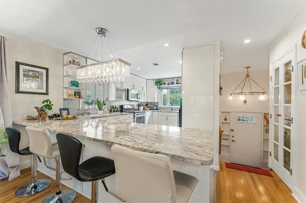 Chandelier, Interior, Kitchen, Pendant Lights, Recessed Lighting, Stainless Steel Appliances, Wood Texture Flooring