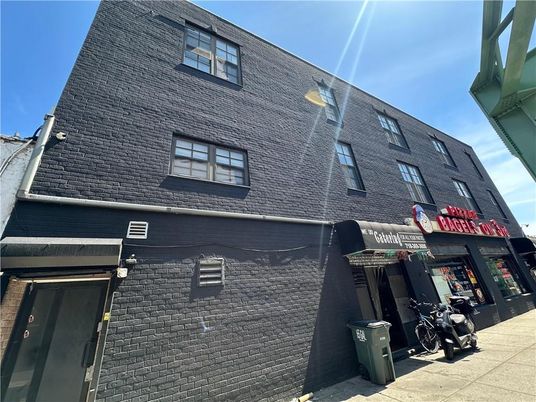 Exterior, Facade, Brick Facade, Condo Building