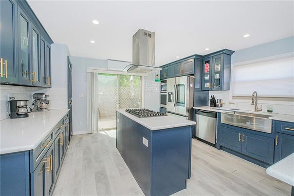 Interior, Kitchen, Recessed Lighting, Stainless Steel Appliances, Wood Texture Flooring