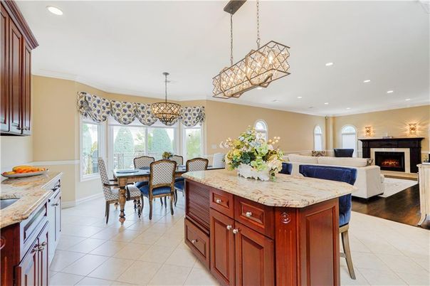 Chandelier, Dining room, Fireplace, Interior, Kitchen, Living room, Pendant Lights, Recessed Lighting, Wood Texture Flooring