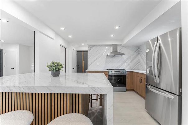 Interior, Kitchen, Marble, Marble Walls, Recessed Lighting, Stainless Steel Appliances