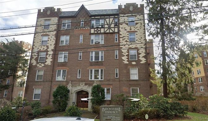 Exterior, Facade, Brick Facade, Condo Building