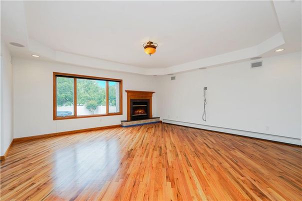 Empty room, Fireplace, Interior, Recessed Lighting, Wood Texture Flooring