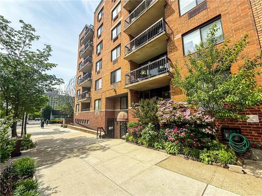 Exterior, Facade, Brick Facade, Condo Building