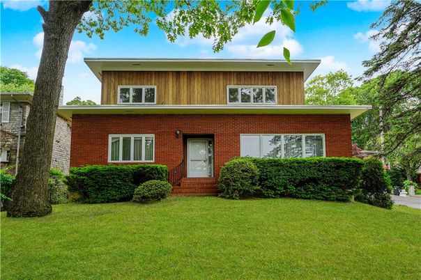Exterior, Facade, Brick Facade, American Foursquare