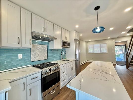 Interior, Kitchen, Pendant Lights, Recessed Lighting, Stainless Steel Appliances, Wood Texture Flooring