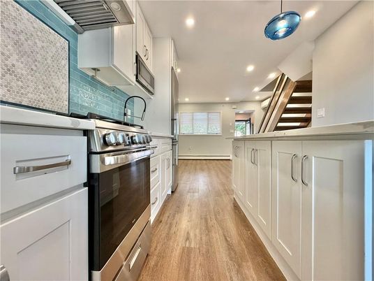 Interior, Kitchen, Recessed Lighting, Stainless Steel Appliances, Wood Texture Flooring