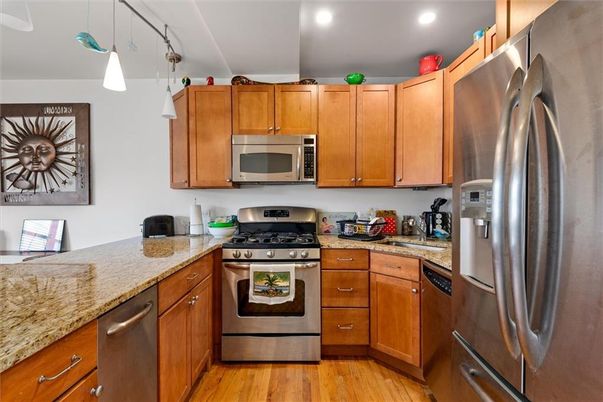 Interior, Kitchen, Pendant Lights, Recessed Lighting, Stainless Steel Appliances, Wood Texture Flooring