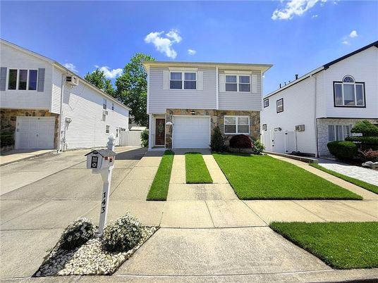 Attached, Exterior, Facade, Raised Ranch
