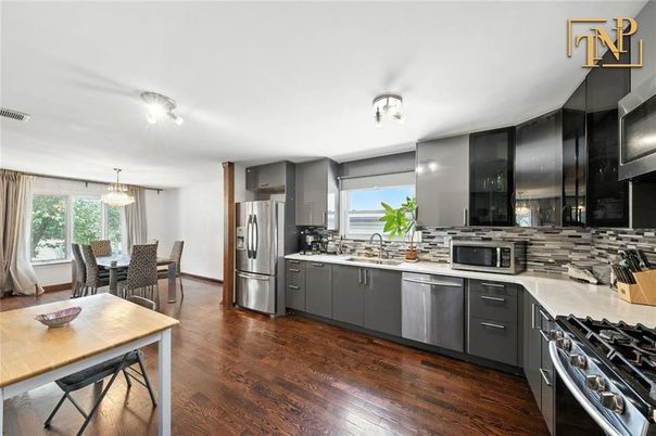 Dining room, Interior, Kitchen, Pendant Lights, Stainless Steel Appliances, Wood Texture Flooring