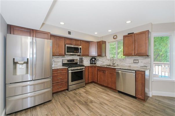 Interior, Kitchen, Recessed Lighting, Stainless Steel Appliances, Wood Texture Flooring