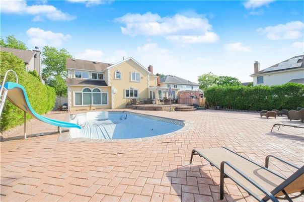 Exterior, Pool, Solar Panels