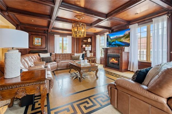 Chandelier, Fireplace, Interior, Living room, Recessed Lighting, Wooden Beams, Wooden Ceilings, Wooden Walls