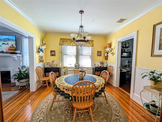 Dining room, Fireplace, Interior, Pendant Lights, Wood Texture Flooring