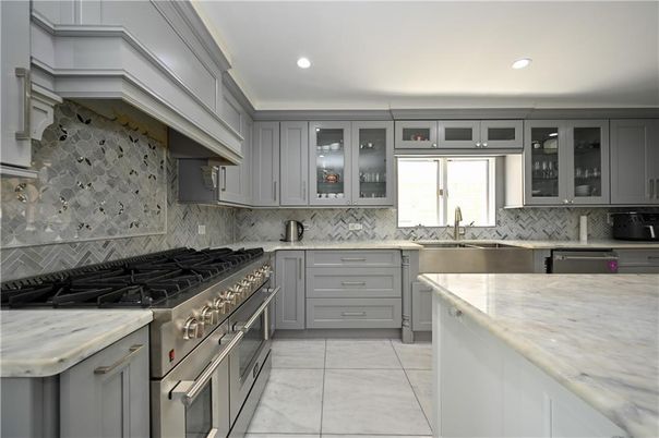 Interior, Kitchen, Marble Walls, Recessed Lighting, Stainless Steel Appliances