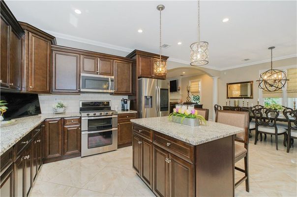 Chandelier, Dining room, Interior, Kitchen, Pendant Lights, Recessed Lighting, Stainless Steel Appliances