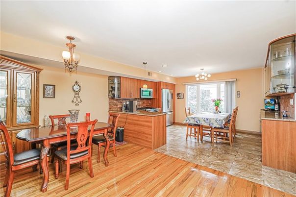 Chandelier, Dining room, Interior, Kitchen, Pendant Lights, Recessed Lighting, Stainless Steel Appliances, Wood Texture Flooring