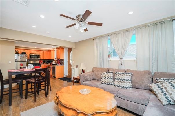 Dining room, Interior, Kitchen, Living room, Recessed Lighting, Stainless Steel Appliances, Wood Texture Flooring