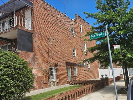 Exterior, Facade, Brick Facade, Condo Building