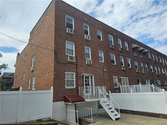 Exterior, Facade, Brick Facade, Condo Building