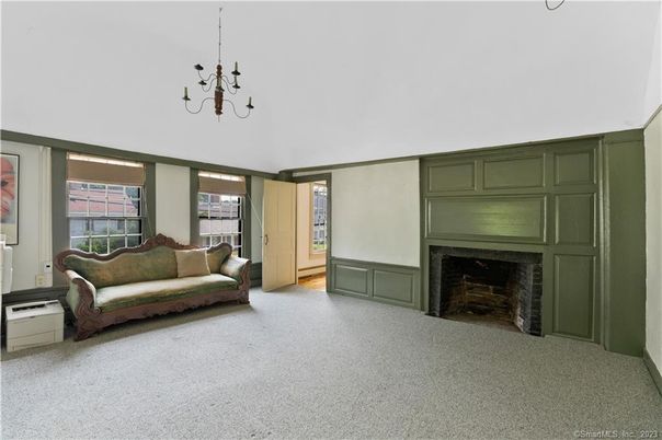 Chandelier, Empty room, Fireplace, Interior